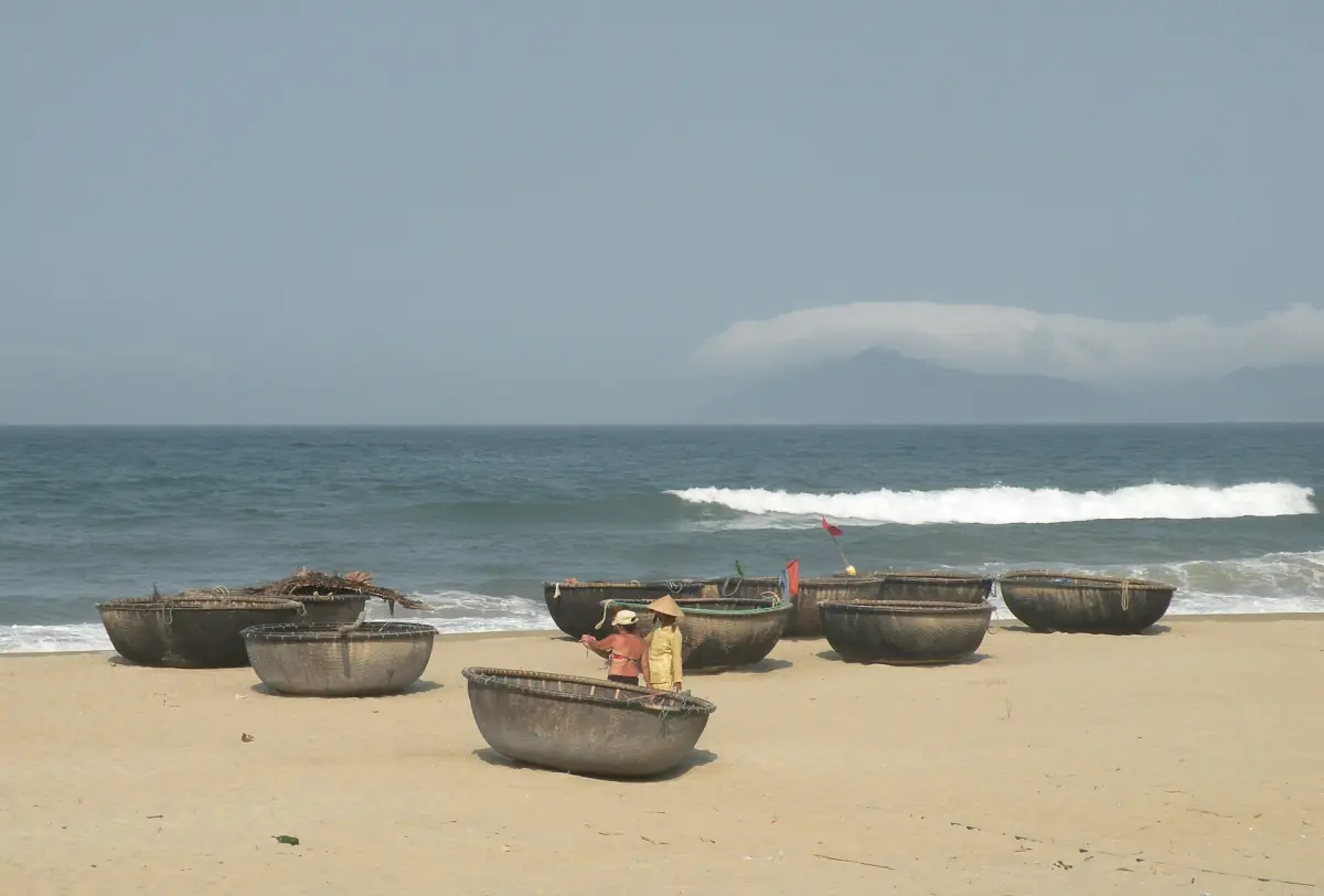 Round basket boats on the beach near Hoi An